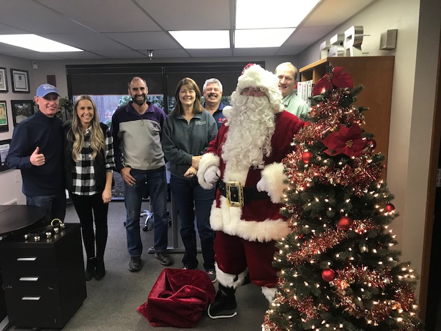 Santa visits Cornerstone Roofing!